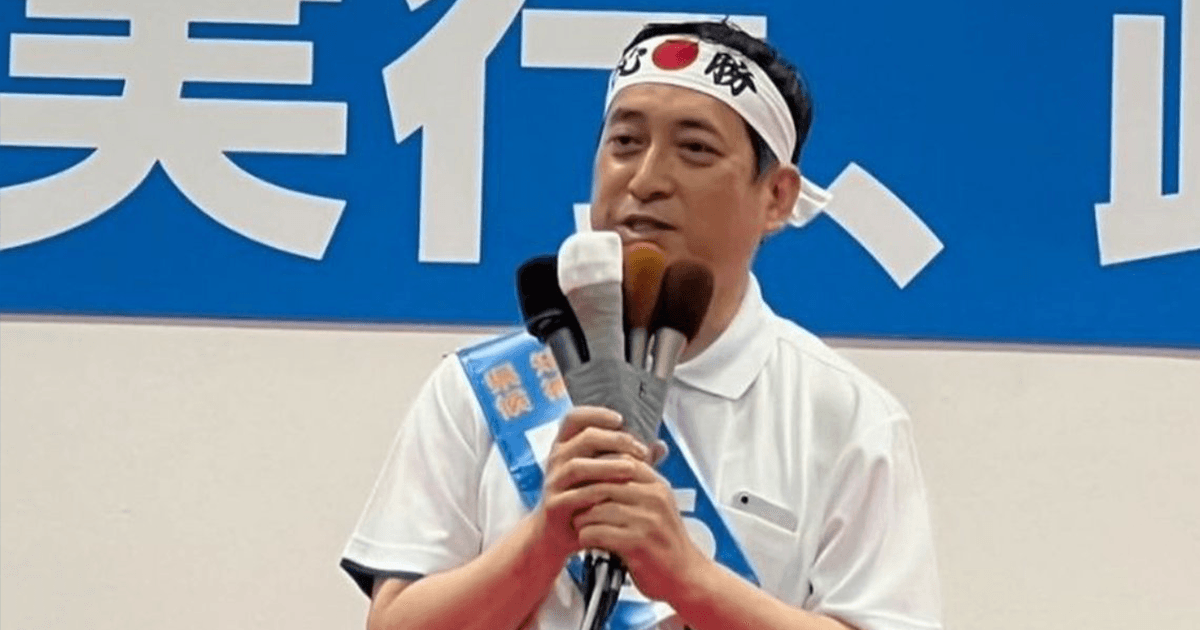 演説を行うしおた康一候補